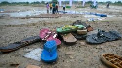 Shoes are pictured at the site of a stampede at Hathras in India's Uttar Pradesh state on July 3