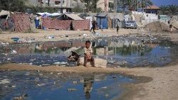 Streets flooded with sewage water in Deir el-Balah in the central Gaza Strip on July 23, 2024, as municipal infrastructures fail due to ongoing bombardments.