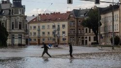 People cross flooded streets in the Czech Republic 