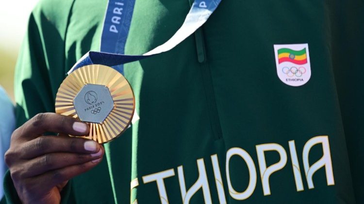 La medaglia d'oro alle Olimpiadi di Tamirat Tola