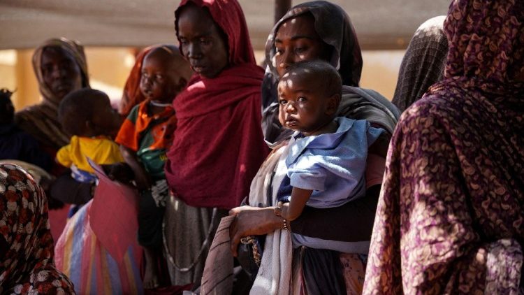 FILE PHOTO: Handout photograph of a woman and baby at the Zamzam displacement camp in North Darfur