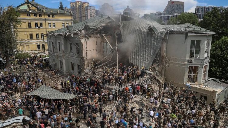 FILE PHOTO: Rescuers work at Ohmatdyt Children's Hospital that was damaged during Russian missile strikes, in Kyiv