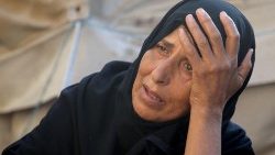 Una mujer desplazada interna en la Franja de Gaza