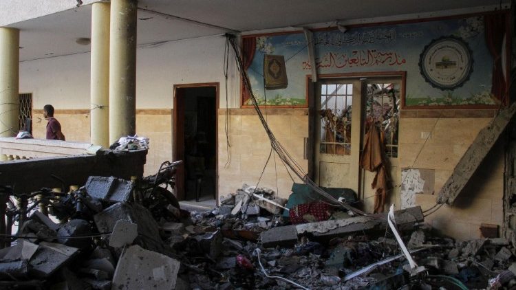 Aftermath of an Israeli strike on a school sheltering displaced people in Gaza City