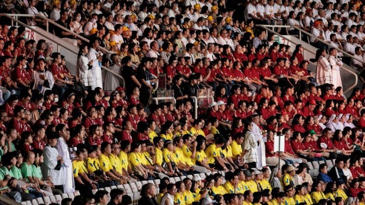 Massgoers gather in Jakarta's stadium