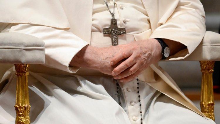 File photo of Pope Francis praying the Rosary