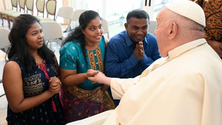 Migrants welcome Pope Francis to Jakarta