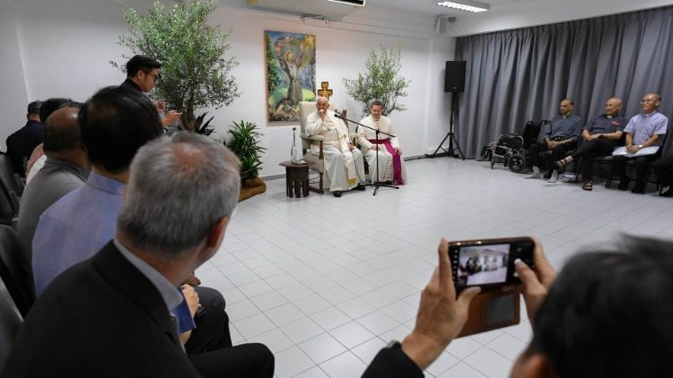 The Pope speaking with Singaporean Jesuits