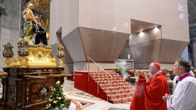 Cardinal Pietro Parolin incenses the sculpture the Blessed Virgin Mary handing the Child Jesus to St Cajetan