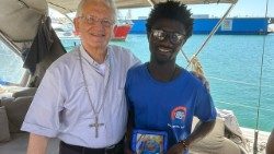 Bishop Pietro Maria Fragnelli with intercultural meditator Ibrahima Lo