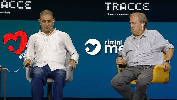 Bassam Aramin (L) and Rami Elhanan (R) on stage in Rimini