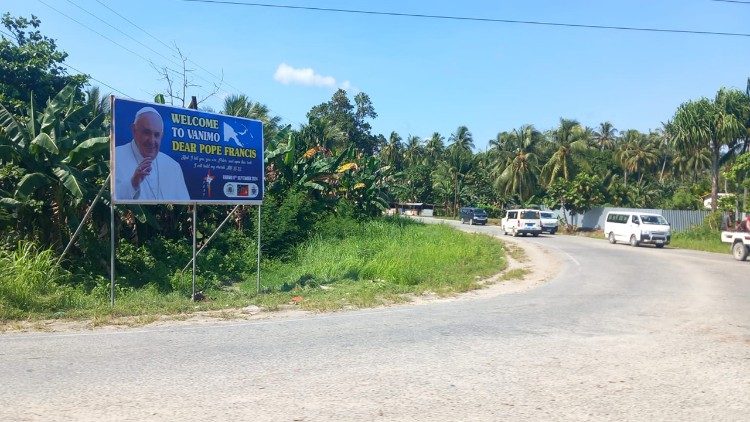 A billboard welcomes Pope Francis to Vanimo