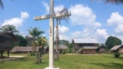 A cross stands in the village of Ibru, at the Chapel of Our Lady of Lujan