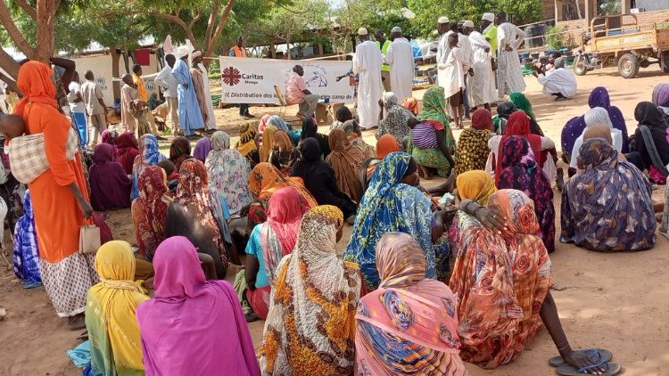 Neighbouring Chad has welcomed an estimated 630,000 refugees and returnees from Sudan. Here, Caritas workers are seen providing support to a group of women. Photo courtesy of Caritas Mongo (Chad)