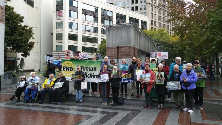 Sisters of the Holy Names  of Jesus and Mary with other Congregations giving public witness against  human trafficking