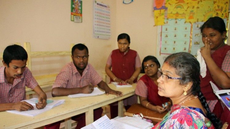 Mrs. Roseline Francis, teacher at the Asha Deepam School, preparing the students for the board exam.