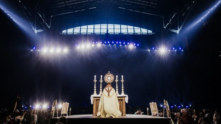 Adoration of the Blessed Sacrament during the opening of the 10th National Eucharistic Congress in the United States