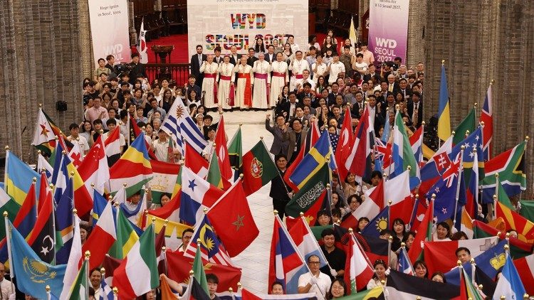 Young participants carry flags from 193 countries during the launch ceremony of World Youth Day 2027 at Myeongdong Cathedral in Seoul. Photo by Archdiocese of Seoul