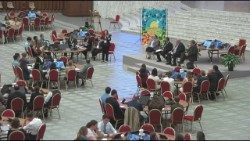 University students meet with Synod delegates in the Paul VI Hall