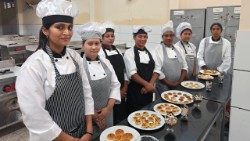 Participants to the St. Joseph’s Institute of Skills culinary program pose for the camera in this undated photo. Photo by Catholic Connect