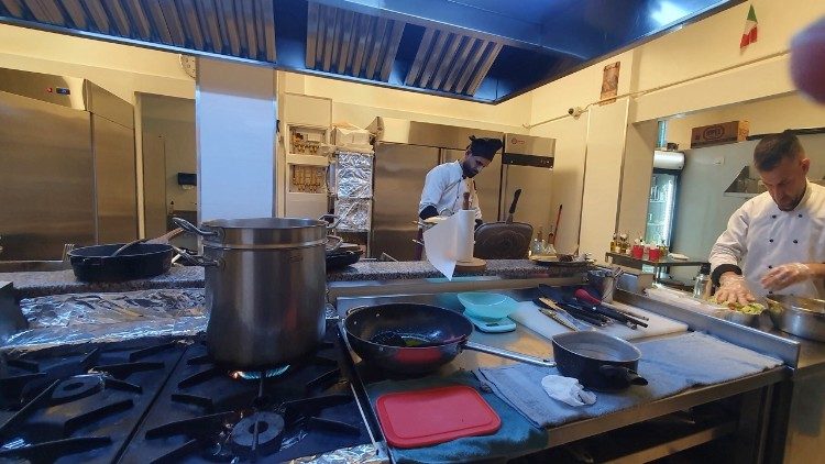 Iraqi refugees working in restaurant